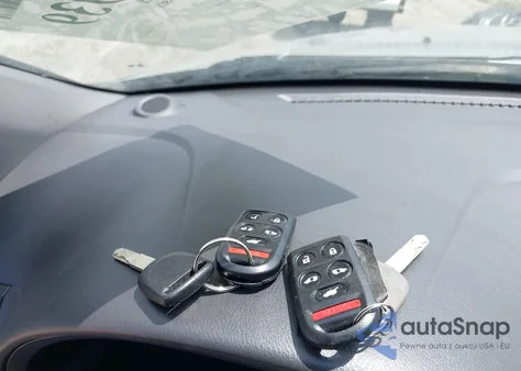 2009 Honda Odyssey Ex-L z USA, uszkodzony, nr VIN 5FNRL38759B001452